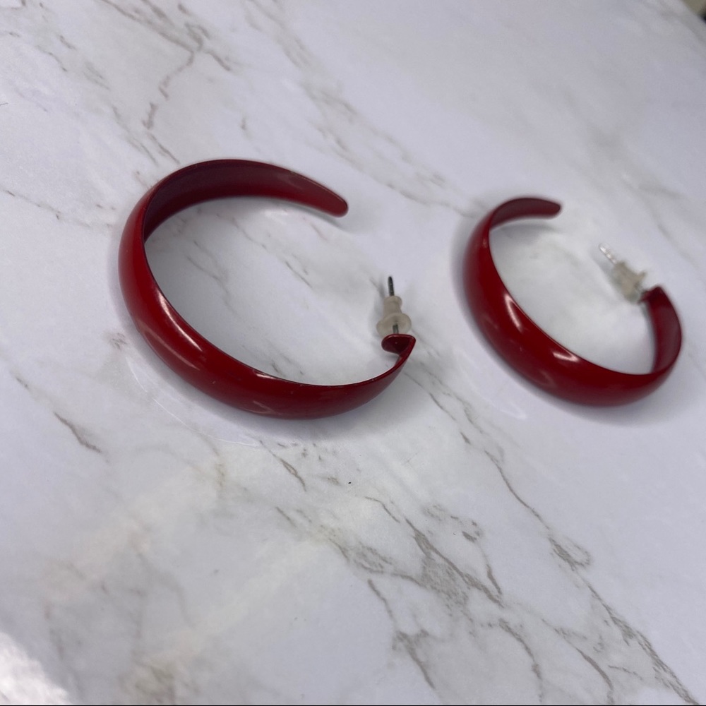 Red hoop earrings